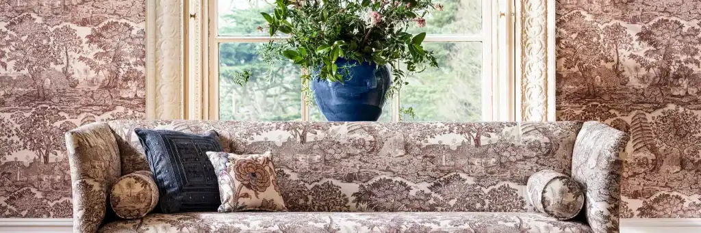 Elegant floral wallpaper in soft tones for sophisticated interior decor.